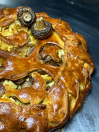 Piroge mit Kartoffeln und geschmortem Schweinefleisch