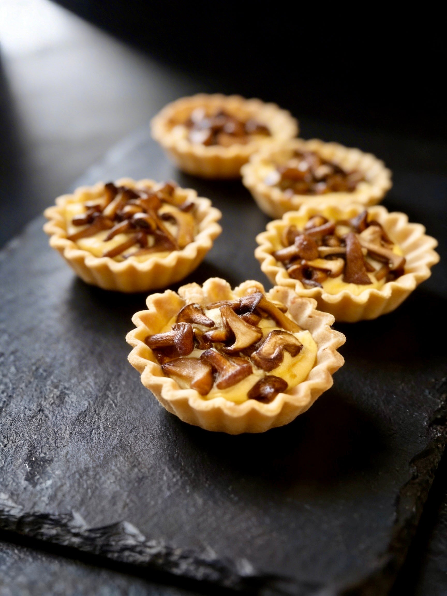 Tartalleten mit Pilzen